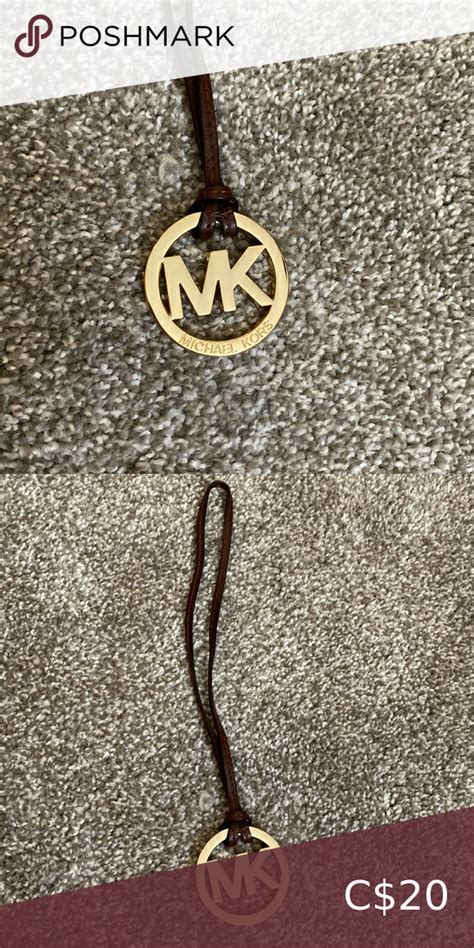 michael kors purse charm with black strap